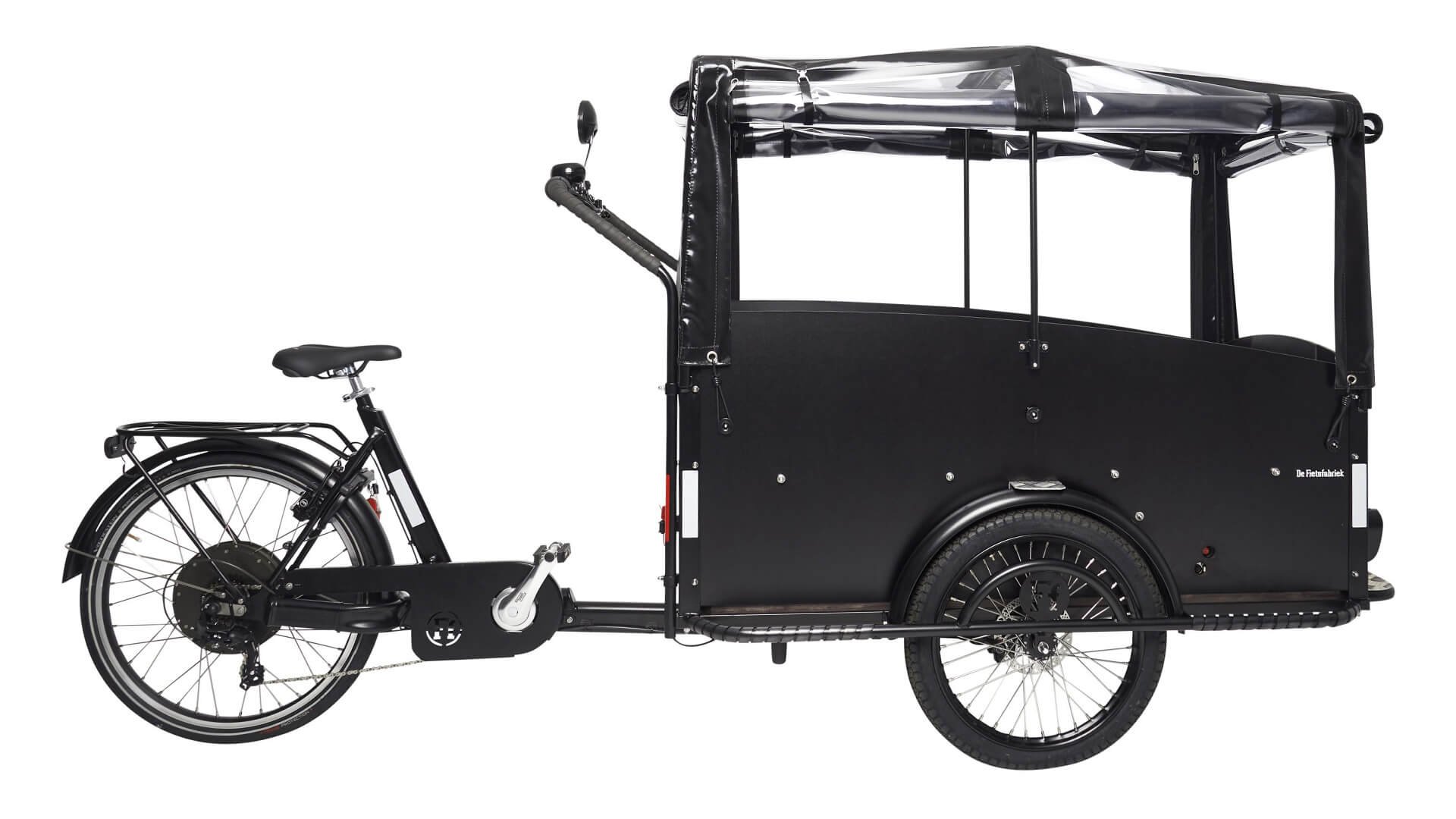 vélobus avec protection pluie sur le coffre (en option) 
